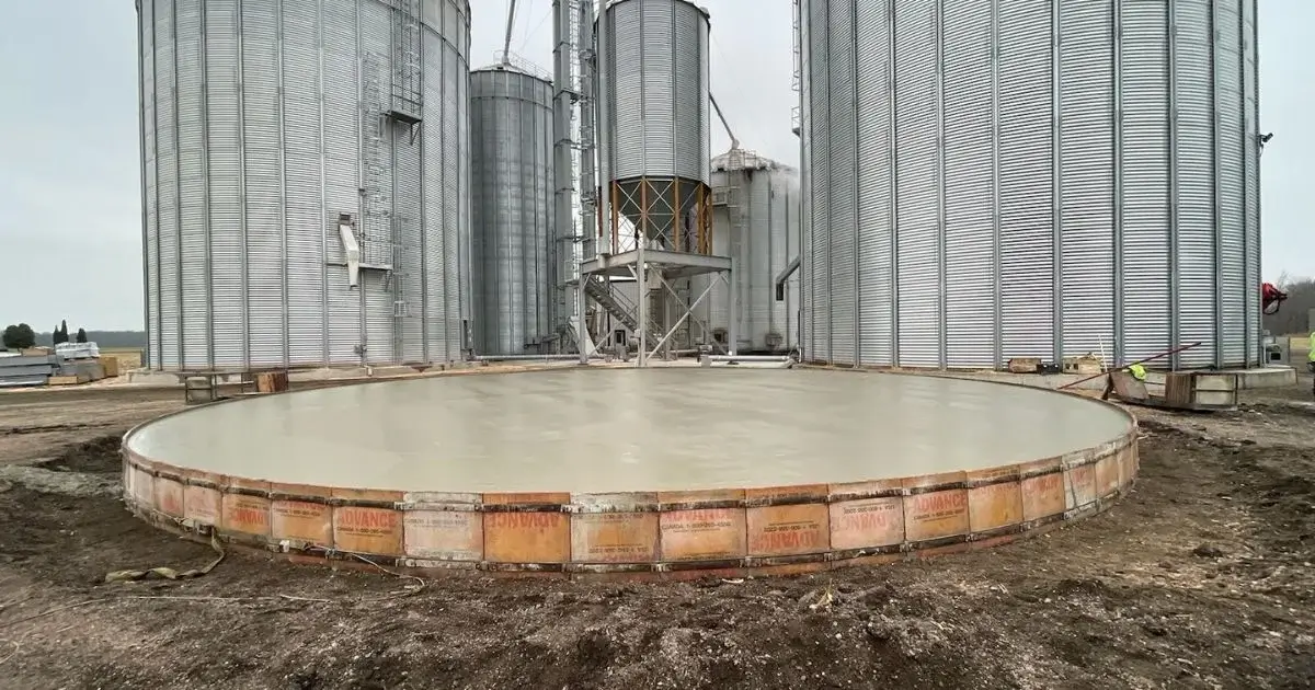 Concrete foundation slab prepared for grain bin installation